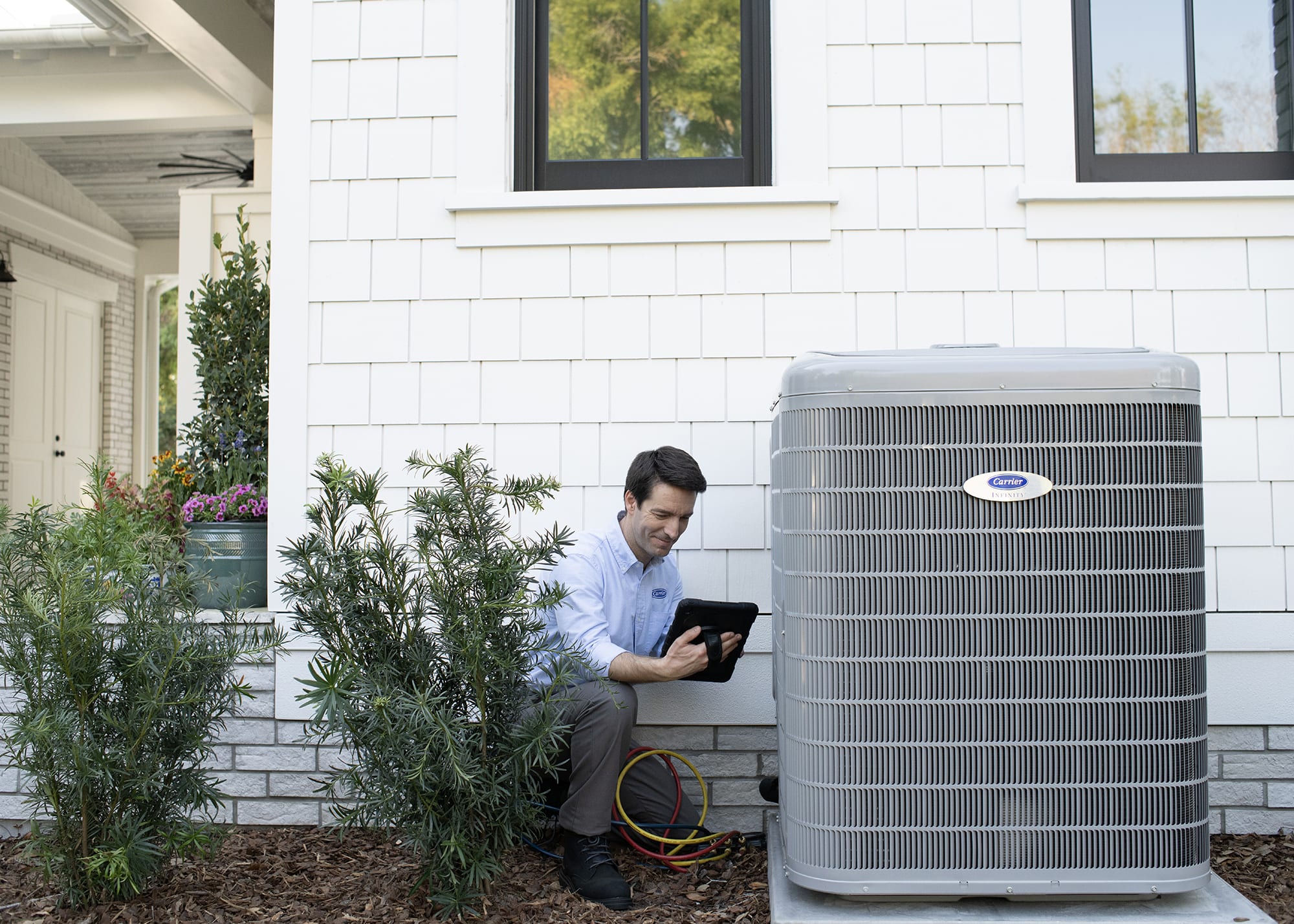 a carrier dealer focusing on sustainability services a carrier air conditioner